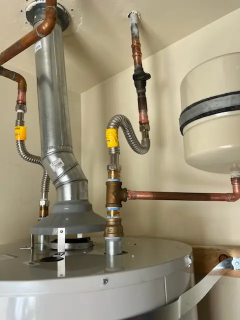 Water heater installation and plumbing repair in Old Mill Court